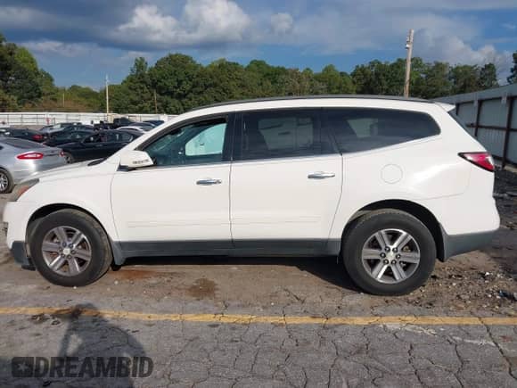 2015 Chevrolet Traverse LT with VIN 1GNKRHKD7FJ117517, listed as a IAAI auction lot 43402929 with 77,894 mi miles and . Bid and sale history available at DreamBid. Image 14.