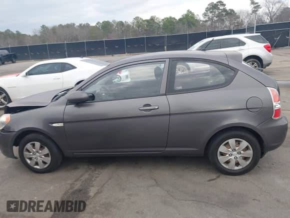 2010 Hyundai Accent Blue z VIN KMHCM3AC1AU158686, wystawiony jako IAAI lot #41466819 z przebiegiem 142 241 mil mil oraz . Historia ofert i sprzedaży dostępna na DreamBid. Obrazek 14.