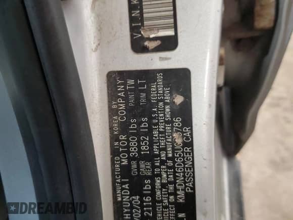 2005 Hyundai Elantra GLS z VIN KMHDN46D65U035786, wystawiony jako Copart lot #70865764 z przebiegiem 277 993 mil mil oraz Szkoda całkowita • Salvage title. Historia ofert i sprzedaży dostępna na DreamBid. Obrazek 13.