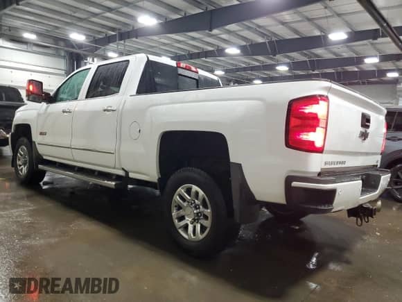 2018 Chevrolet Silverado 3500HD LTZ with VIN 1GC4K0EY2JF151852, listed as a Copart auction lot 86372114 with 218,717 mi miles and Salvage title. Bid and sale history available at DreamBid. Image 2.