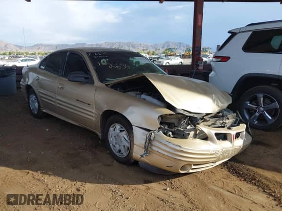 2001 Pontiac Grand Am SE z VIN 1G2NE52T81M582634, wystawiony jako IAAI lot #42652160 z przebiegiem Nie podano mil oraz . Historia ofert i sprzedaży dostępna na DreamBid. Obrazek 1.