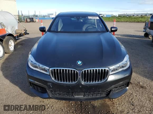 2019 BMW 7 Series 750i xDrive с VIN WBA7F2C57KB239470, выставлен на аукционе Copart как лот 67986555 с пробегом 70 821 миль миль и На запчасти • Non repairable. История ставок и продаж доступна на DreamBid. Изображение 5.
