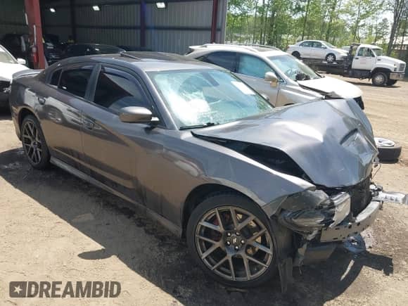 2017 Dodge Charger R/T z VIN 2C3CDXCT1HH605219, wystawiony jako IAAI lot #42095168 z przebiegiem 144 951 mil mil oraz . Historia ofert i sprzedaży dostępna na DreamBid. Obrazek 1.