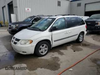 2007 Dodge Caravan SXT with VIN 1D4GP45R57B161051, listed as a Copart auction lot 58259765 with 105,658 mi miles and Salvage title. Bid and sale history available at DreamBid. Image 1.