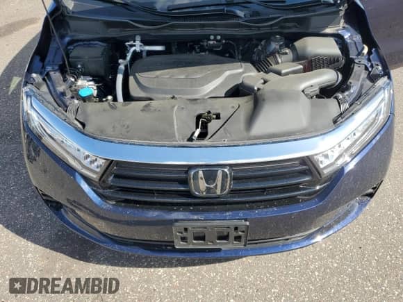 2024 Honda Odyssey Touring с VIN 5FNRL6H82RB036802, выставлен на аукционе Copart как лот 69611275 с пробегом 18 899 миль миль и Списание • Salvage title. История ставок и продаж доступна на DreamBid. Изображение 12.