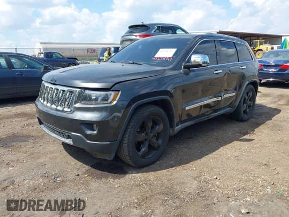 2011 Jeep Grand Cherokee Overland Summit with VIN 1J4RR6GT7BC728944, listed as a IAAI auction lot 43278747 with 193,581 mi miles and . Bid and sale history available at DreamBid. Image 2.