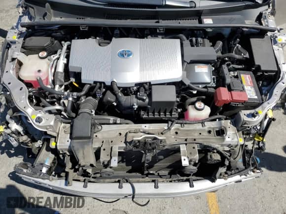 2018 Toyota Prius Plus z VIN JTDKARFP7J3099284, wystawiony jako Copart lot #58186915 z przebiegiem 51 694 mil mil oraz Szkoda całkowita • Salvage title. Historia ofert i sprzedaży dostępna na DreamBid. Obrazek 11.