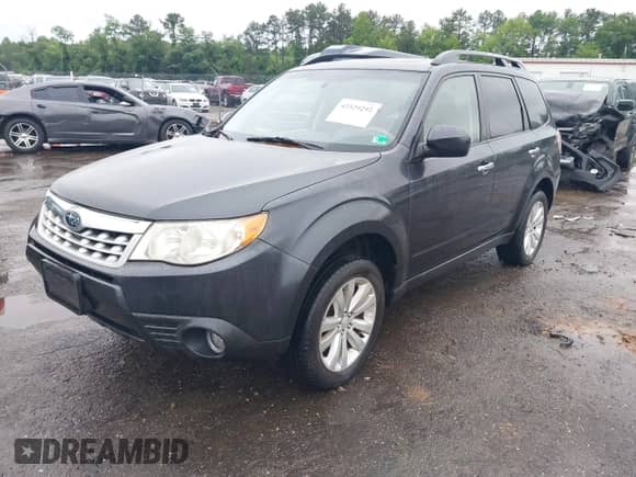 2013 Subaru Forester X Limited with VIN JF2SHAECXDH403678, listed as a IAAI auction lot 42329292 with 204,950 mi miles and . Bid and sale history available at DreamBid. Image 2.