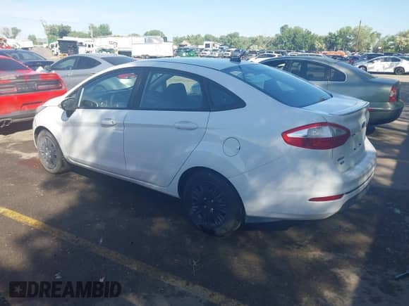 2015 Ford Fiesta SE with VIN 3FADP4BE7FM130592, listed as a IAAI auction lot 42348148 with 96,481 mi miles and . Bid and sale history available at DreamBid. Image 3.