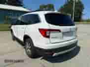 2022 Honda Pilot EX-L with VIN 5FNYF6H50NB018186, listed as a Copart auction lot 80308255 with 147,297 mi miles and Clean title. Bid and sale history available at DreamBid. Image 3.