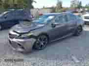 2019 Toyota Camry SE z VIN 4T1B11HK6KU852555, wystawiony jako IAAI lot #43365453 z przebiegiem 171 578 mil mil oraz . Historia ofert i sprzedaży dostępna na DreamBid. Obrazek 2.