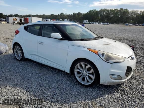 2012 Hyundai Veloster w/Gray Int z VIN KMHTC6AD0CU056764, wystawiony jako Copart lot #84646725 z przebiegiem 157 456 mil mil oraz Czysty tytuł • Clean title. Historia ofert i sprzedaży dostępna na DreamBid. Obrazek 4.