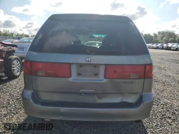 2001 Honda Odyssey LX с VIN 2HKRL18531H540774, выставлен на аукционе Copart как лот 57670255 с пробегом 209 379 миль миль и Списание • Salvage title. История ставок и продаж доступна на DreamBid. Изображение 6.