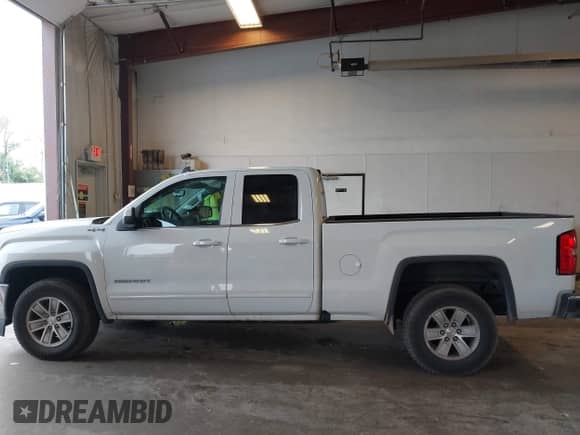 2017 GMC Sierra 1500 SLE with VIN 1GTV2MEC8HZ205115, listed as a IAAI auction lot 43244018 with 113,315 mi miles and . Bid and sale history available at DreamBid. Image 14.