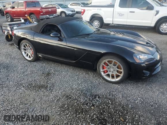 2004 Dodge Viper SRT-10 with VIN 1B3JZ65Z54V100478, listed as a Copart auction lot 80229194 with Not provided miles and Salvage title. Bid and sale history available at DreamBid. Image 4.