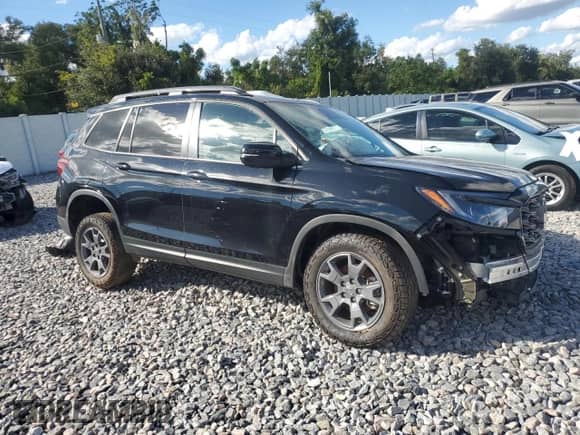 2024 Honda Passport TrailSport with VIN 5FNYF8H66RB016565, listed as a Copart auction lot 86606005 with Not provided miles and Clean title. Bid and sale history available at DreamBid. Image 4.