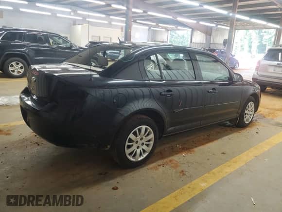 2010 Chevrolet Cobalt LS с VIN 1G1AB5F56A7161405, выставлен на аукционе Copart как лот 69129945 с пробегом 122 708 миль миль и Списание • Salvage title. История ставок и продаж доступна на DreamBid. Изображение 3.