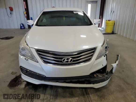 2015 Hyundai Azera z VIN KMHFG4JG1FA478130, wystawiony jako Copart lot #49274965 z przebiegiem 134 572 mil mil oraz Szkoda całkowita • Salvage title. Historia ofert i sprzedaży dostępna na DreamBid. Obrazek 5.