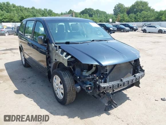 2014 Dodge Grand Caravan SE with VIN 2C4RDGBG7ER248080, listed as a IAAI auction lot 42683662 with 128,616 mi miles and . Bid and sale history available at DreamBid. Image 6.