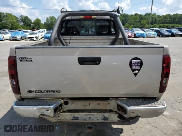 2006 Chevrolet Colorado с VIN 1GCDT148468245084, выставлен на аукционе Copart как лот 68434695 с пробегом 186 114 миль миль и Списание • Salvage title. История ставок и продаж доступна на DreamBid. Изображение 6.