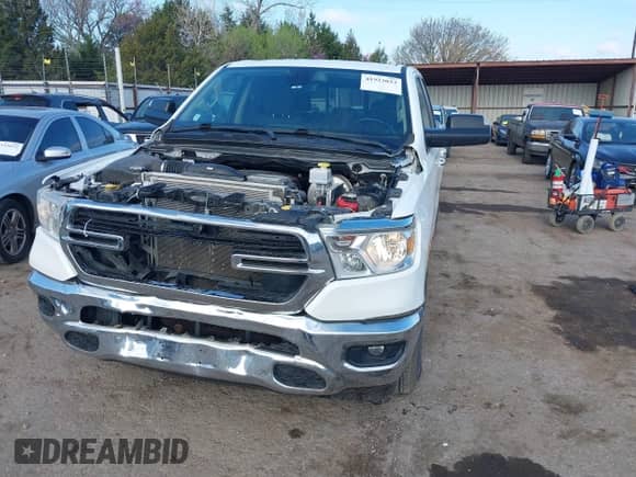 2019 Ram 1500 Big Horn with VIN 1C6SRFBT0KN822397, listed as a IAAI auction lot 41923033 with 104,614 mi miles and . Bid and sale history available at DreamBid. Image 2.
