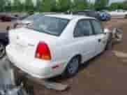 2005 Hyundai Accent GLS z VIN KMHCG45C95U594330, wystawiony jako IAAI lot #42491496 z przebiegiem 258 170 mil mil oraz . Historia ofert i sprzedaży dostępna na DreamBid. Obrazek 4.