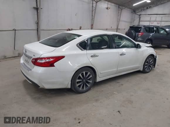 2016 Nissan Altima S with VIN 1N4AL3AP8GC231557, listed as a IAAI auction lot 42983363 with 104,867 mi miles and . Bid and sale history available at DreamBid. Image 4.