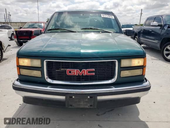 1997 GMC Sierra 1500 z VIN 2GTEC19R9V1544545, wystawiony jako Copart lot #61717075 z przebiegiem 212 464 mil mil oraz Czysty tytuł • Clean title. Historia ofert i sprzedaży dostępna na DreamBid. Obrazek 5.