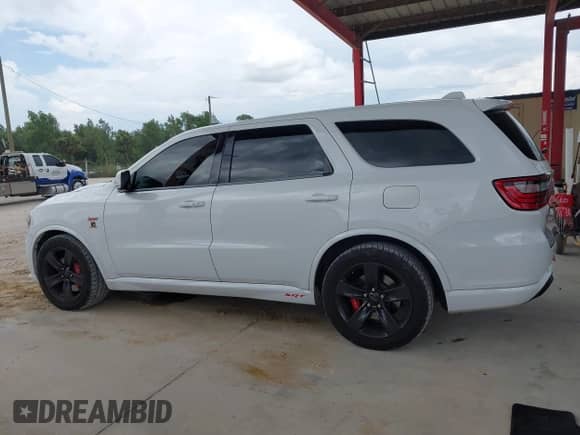 2018 Dodge Durango SRT with VIN 1C4SDJGJ0JC255619, listed as a IAAI auction lot 42938947 with 136,646 mi miles and . Bid and sale history available at DreamBid. Image 15.