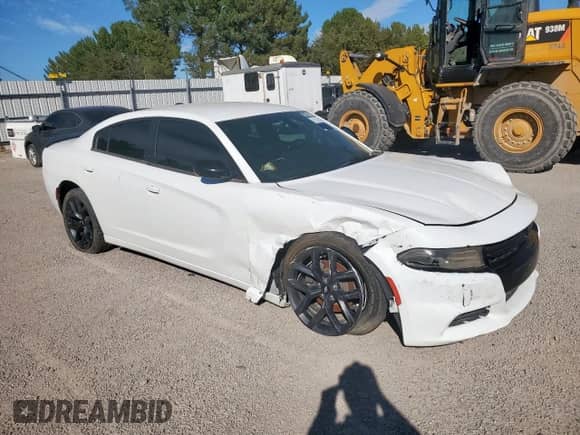 2019 Dodge Charger SXT with VIN 2C3CDXBG5KH580868, listed as a Copart auction lot 85667395 with 55,493 mi miles and Clean title. Bid and sale history available at DreamBid. Image 4.