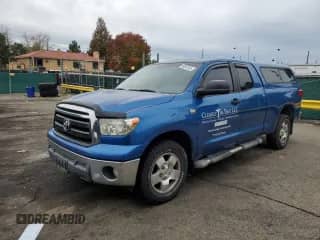 2010 Toyota Tundra with VIN 5TFUM5F1XAX005251, listed as a Copart auction lot 86097505 with 225,471 mi miles and Clean title. Bid and sale history available at DreamBid. Image 1.