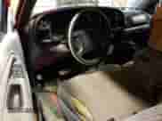 1999 Dodge 1500 z VIN 1B7HC13Y9XJ580712, wystawiony jako Copart lot #38219694 z przebiegiem Nie podano mil oraz Szkoda całkowita • Salvage title. Historia ofert i sprzedaży dostępna na DreamBid. Obrazek 8.