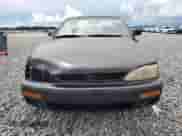 1996 Toyota Camry DX z VIN 4T1BG12K7TU811280, wystawiony jako Copart lot #72037795 z przebiegiem 110 064 mil mil oraz Szkoda całkowita • Salvage title. Historia ofert i sprzedaży dostępna na DreamBid. Obrazek 5.