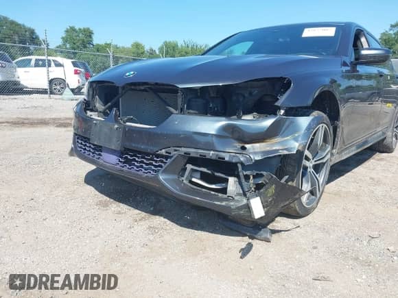 2016 BMW 7 Series 750i xDrive with VIN WBA7F2C58GG420247, listed as a IAAI auction lot 42857007 with 106,330 mi miles and . Bid and sale history available at DreamBid. Image 6.