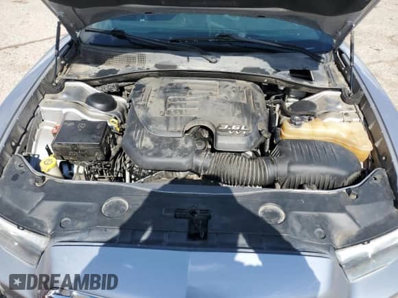 2013 Dodge Charger SXT Plus z VIN 2C3CDXHG2DH655875, wystawiony jako Copart lot #80498155 z przebiegiem 141 538 mil mil oraz Szkoda całkowita • Salvage title. Historia ofert i sprzedaży dostępna na DreamBid. Obrazek 11.