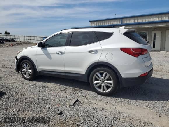 2014 Hyundai Santa Fe with VIN 5XYZUDLA2EG202069, listed as a Copart auction lot 70583405 with 190,694 mi miles and Salvage title. Bid and sale history available at DreamBid. Image 2.