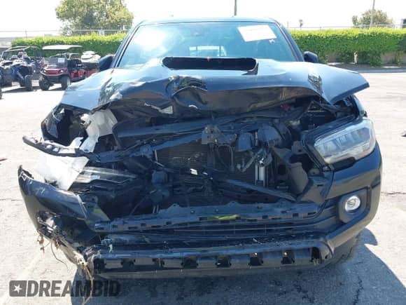 2023 Toyota Tacoma SR5 z VIN 3TMDZ5BN7PM148621, wystawiony jako IAAI lot #42928723 z przebiegiem 70 708 mil mil oraz . Historia ofert i sprzedaży dostępna na DreamBid. Obrazek 6.