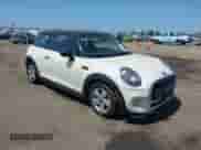 2017 MINI Hardtop Cooper with VIN WMWXP5C39H2D71459, listed as a IAAI auction lot 42111245 with 97,759 mi miles and . Bid and sale history available at DreamBid. Image 1.