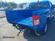 2023 Ram 1500 Big Horn with VIN 1C6RRFBG9PN596157, listed as a IAAI auction lot 42579791 with 14,303 mi miles and . Bid and sale history available at DreamBid. Image 6.