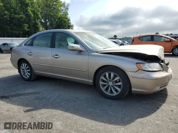 2008 Hyundai Azera Limited с VIN KMHFC46F48A265722, выставлен на аукционе Copart как лот 69729245 с пробегом 154 033 миль миль и Списание • Salvage title. История ставок и продаж доступна на DreamBid. Изображение 4.