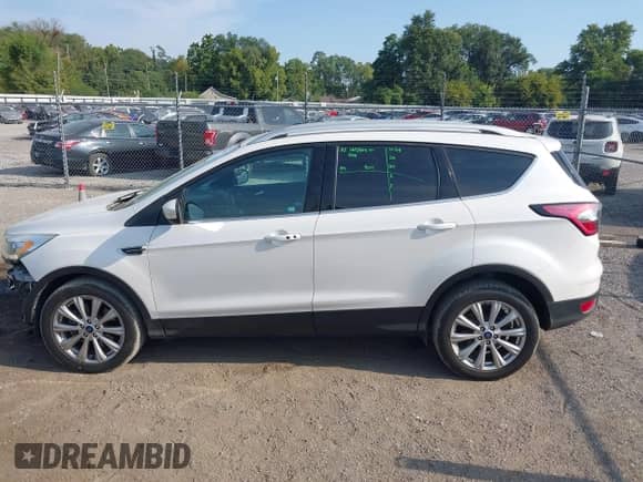 2017 Ford Escape Titanium z VIN 1FMCU9J97HUD36618, wystawiony jako IAAI lot #43216660 z przebiegiem 150 371 mil mil oraz . Historia ofert i sprzedaży dostępna na DreamBid. Obrazek 15.