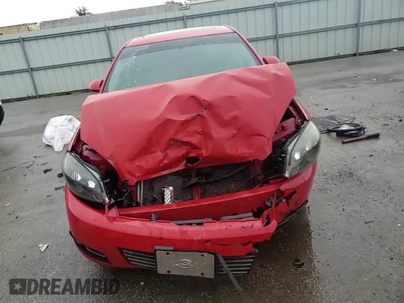 2011 Chevrolet Impala LT Retail with VIN 2G1WB5EK4B1151614, listed as a Copart auction lot 58769175 with 142,280 mi miles and Salvage title. Bid and sale history available at DreamBid. Image 13.