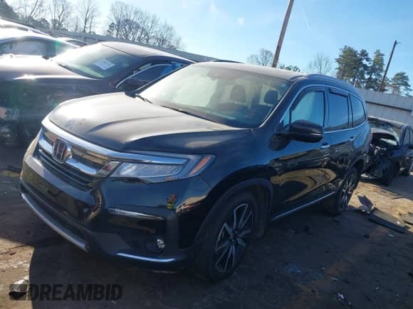 2022 Honda Pilot Elite with VIN 5FNYF6H03NB085997, listed as a IAAI auction lot 41823176 with 21,646 mi miles and . Bid and sale history available at DreamBid. Image 17.