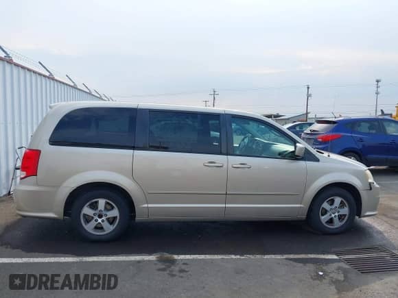 2013 Dodge Grand Caravan SXT z VIN 2C4RDGCG6DR580721, wystawiony jako IAAI lot #43040666 z przebiegiem 206 777 mil mil oraz . Historia ofert i sprzedaży dostępna na DreamBid. Obrazek 14.