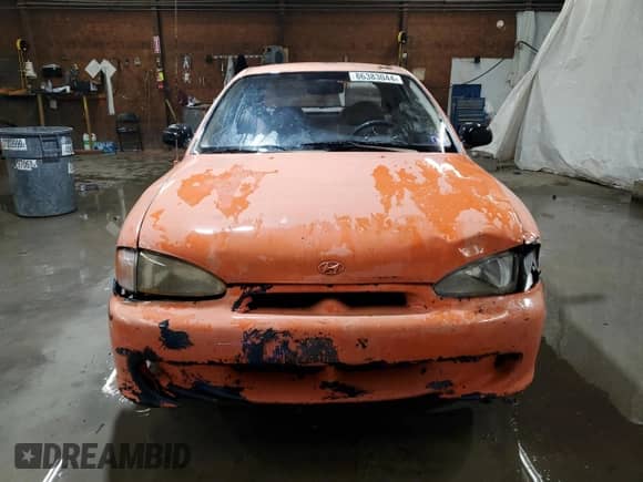 1997 Hyundai Accent z VIN KMHVD14NXVU221266, wystawiony jako Copart lot #86383044 z przebiegiem 159 517 mil mil oraz Szkoda całkowita • Salvage title. Historia ofert i sprzedaży dostępna na DreamBid. Obrazek 5.