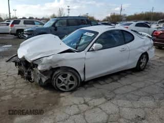 2000 Hyundai Tiburon с VIN KMHJG35F9YU191917, выставлен на аукционе Copart как лот 79629394 с пробегом 179 948 миль миль и Списание • Salvage title. История ставок и продаж доступна на DreamBid. Изображение 1.