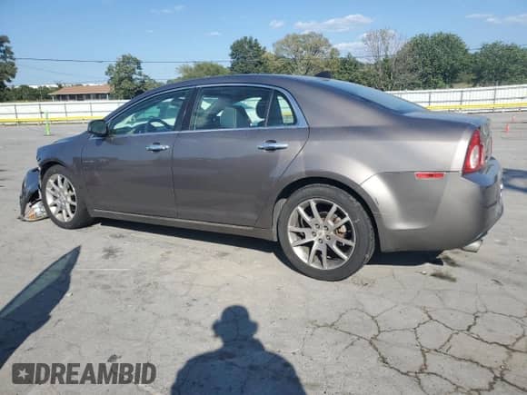 2012 Chevrolet Malibu LTZ with VIN 1G1ZG5E73CF117104, listed as a Copart auction lot 81546505 with 230,214 mi miles and Salvage title. Bid and sale history available at DreamBid. Image 2.