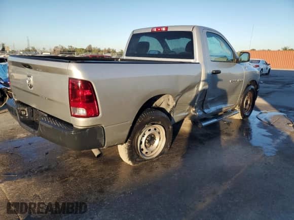2012 Ram 1500 ST with VIN 3C6JD6AK2CG221327, listed as a Copart auction lot 82463844 with 63,813 mi miles and Salvage title. Bid and sale history available at DreamBid. Image 3.