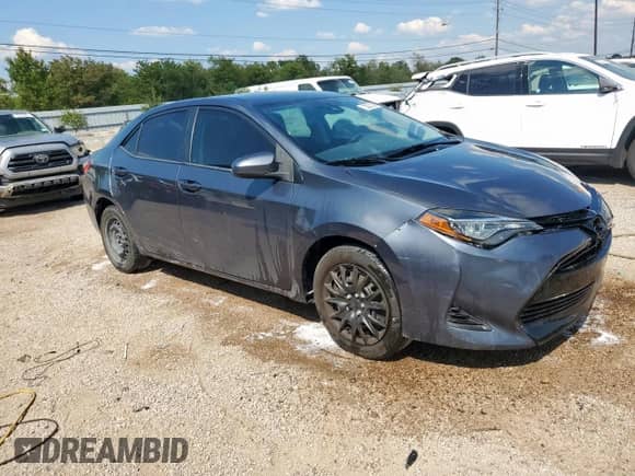 2019 Toyota Corolla LE с VIN 5YFBURHE3KP900210, выставлен на аукционе Copart как лот 84746675 с пробегом 128 851 миль миль и Чистый • Clean title. История ставок и продаж доступна на DreamBid. Изображение 4.