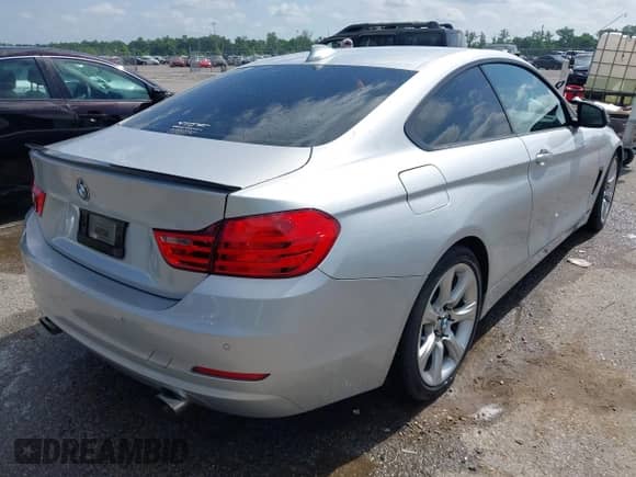 2014 BMW 4 Series 435i z VIN WBA3R1C52EK191381, wystawiony jako IAAI lot #42257612 z przebiegiem 161 112 mil mil oraz . Historia ofert i sprzedaży dostępna na DreamBid. Obrazek 4.